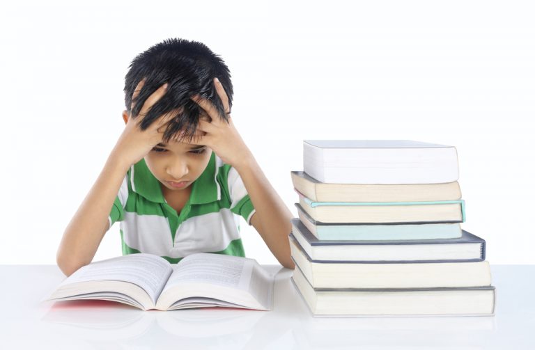 little-boy-stressed-with-books-768x503.jpg