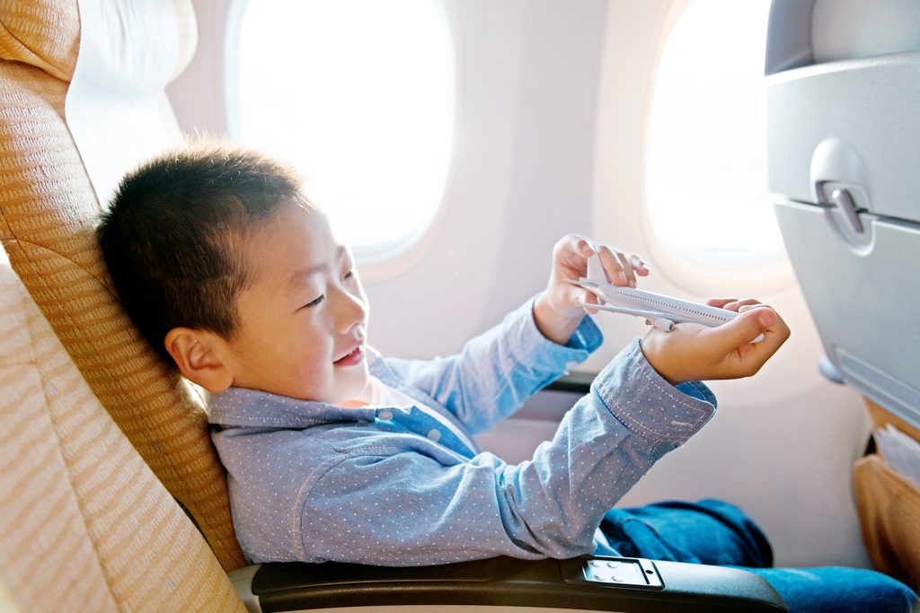 asian-boy-playing-with-toy-airplane-1024x683.jpg
