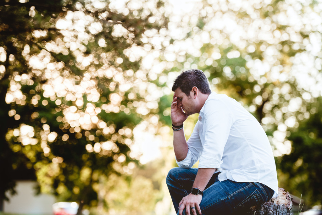 support for dads - depressed man in park