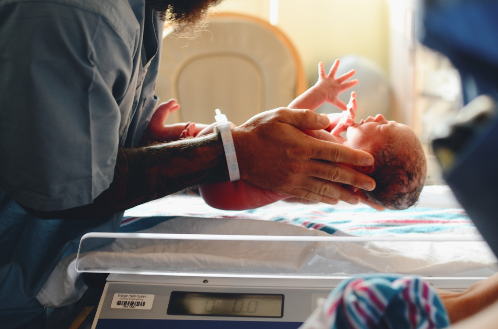 weighing a newborn