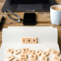 scrabble letters spelling tax