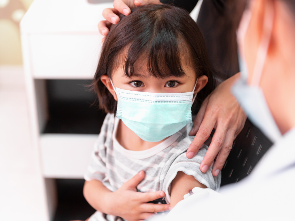 paediatric clinics in Singapore - girl with mask