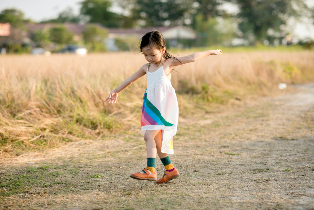 repeal 377A - girl in rainbow dress