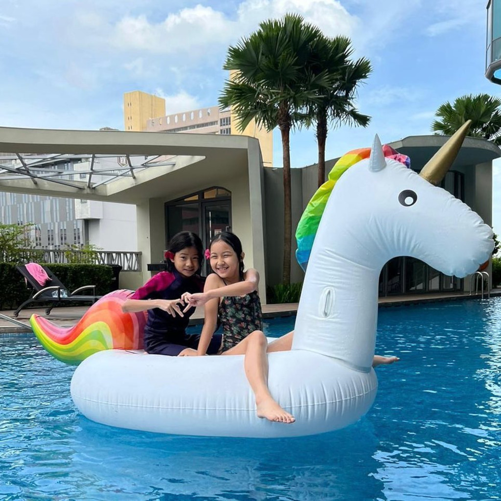Lauren & Georgia on unicorn float