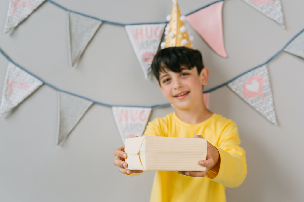 love languages - boy giving gift