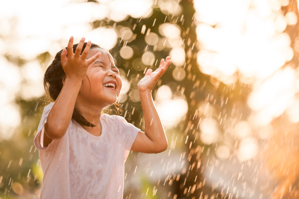 girl getting sunlight outdoors to prevent myopia