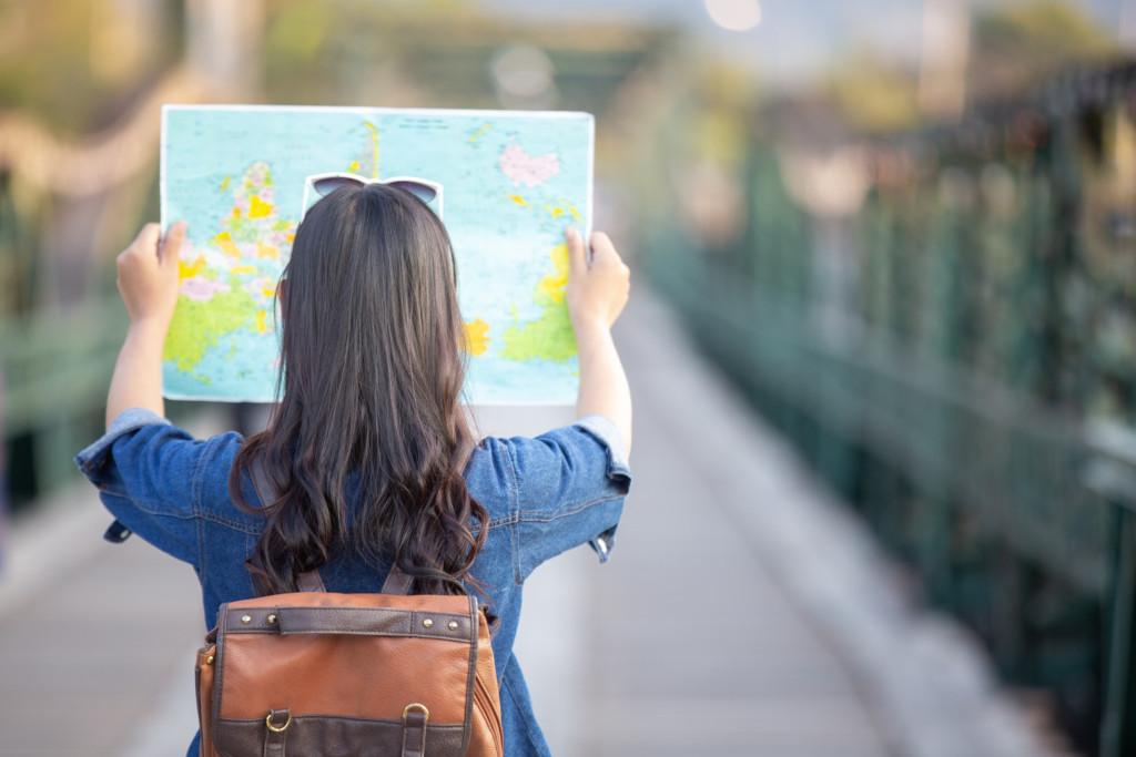 woman looking at map