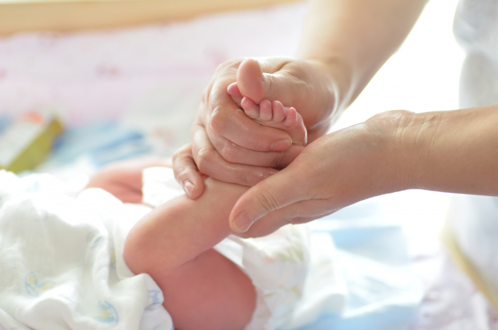 mother-massaging-baby-foot.jpg