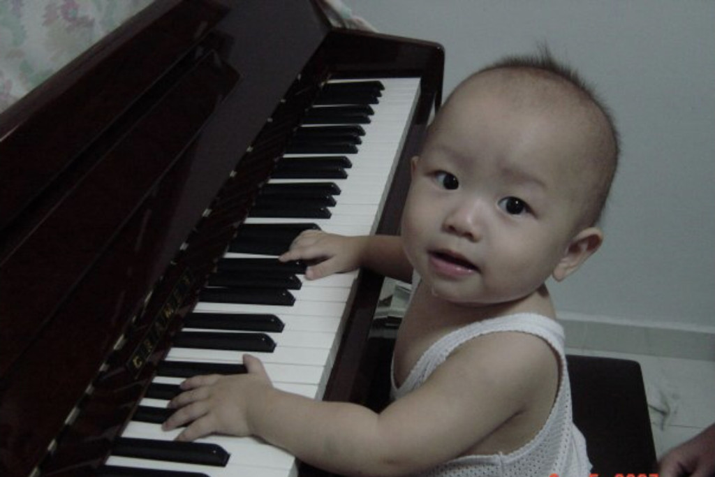 born deaf, Hon Wei at one loving the piano