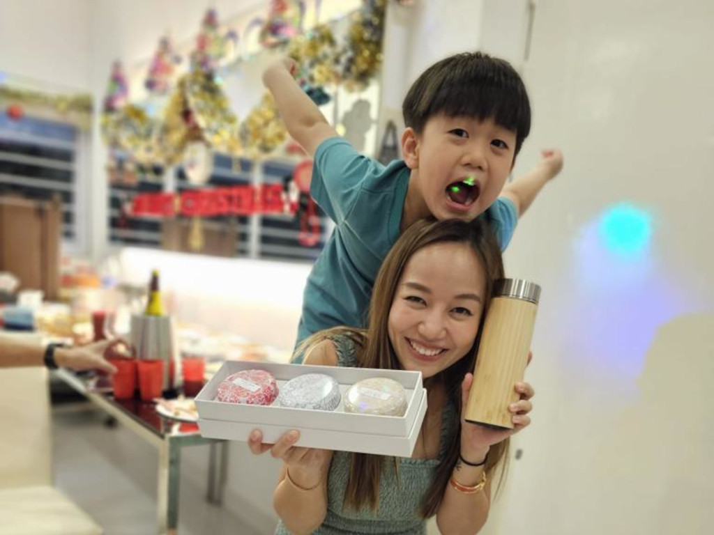 new Singapore citizen Kay Cheong with her son