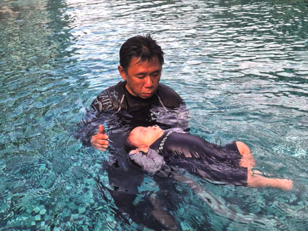 baby swimming lessons with Coach Athan and Dip Swim - float